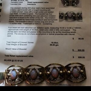 925 TAXCO imitation opal bracelet w/ appraisal. Bracelet is 7 inches long and ab